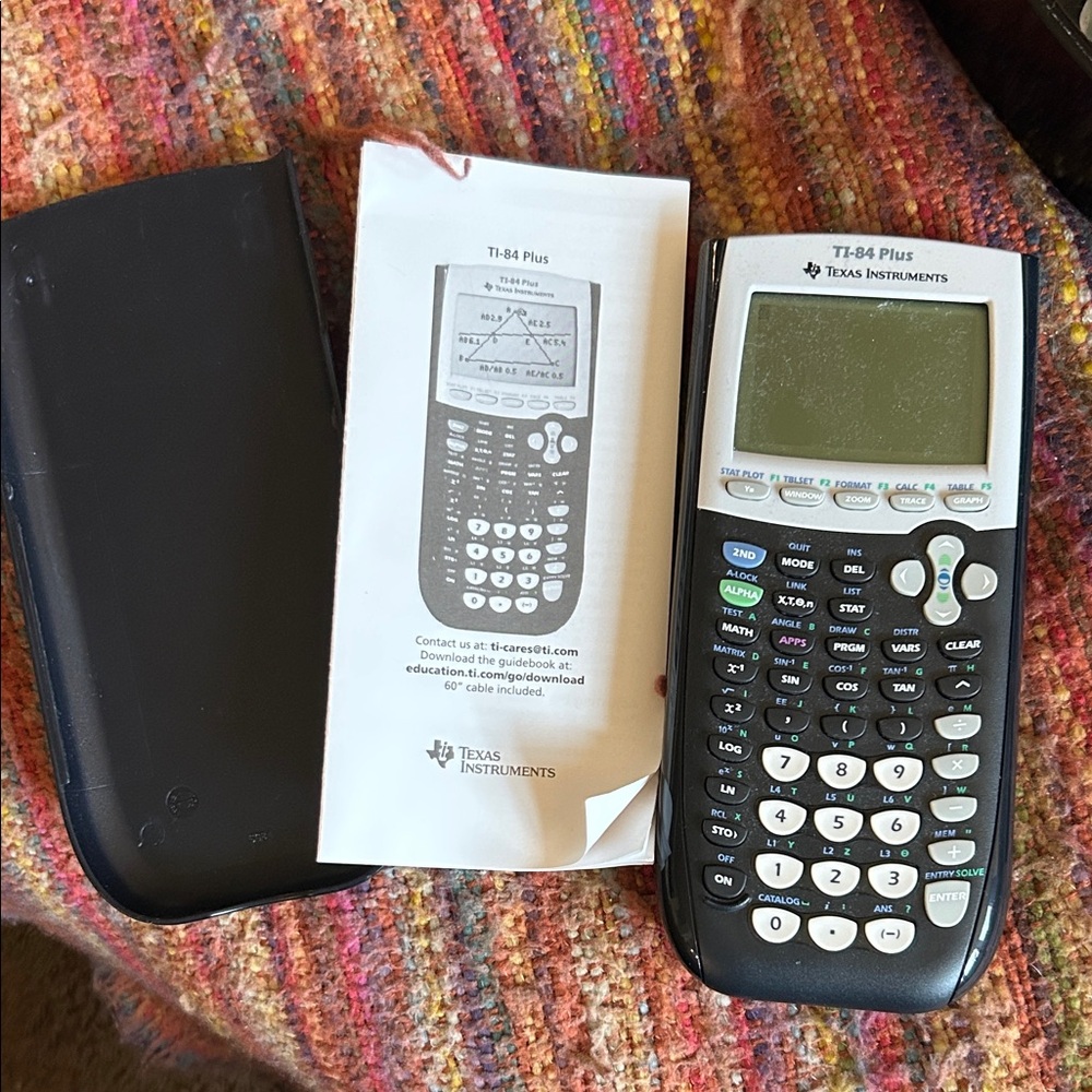 Texas Instruments TI-84 Plus Graphing Calculator - Black and White